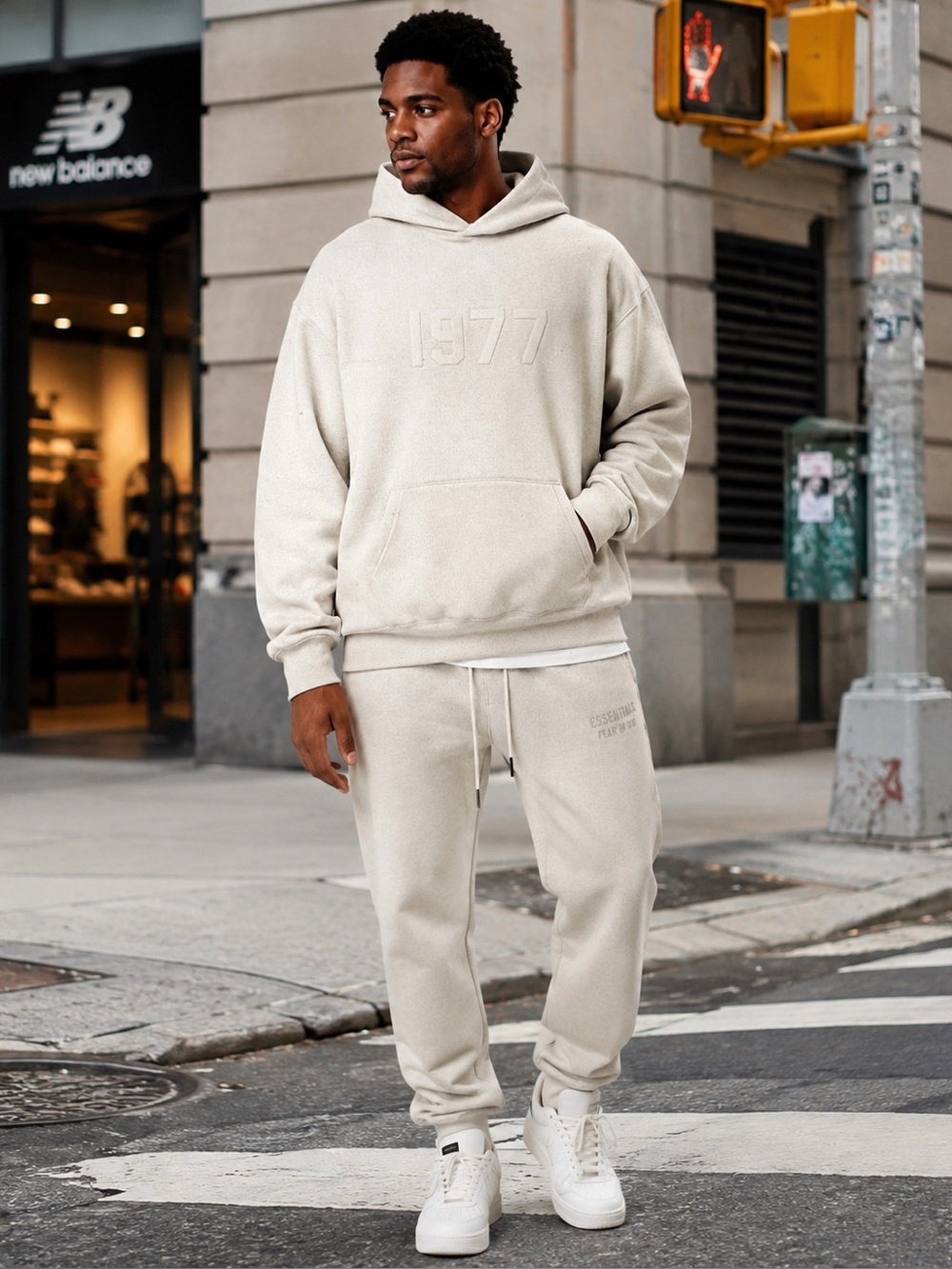 FEAR OF GOD ESSENTIALS
logo-embossed Heathered grey 1977 jersey hoodie Mens XXL